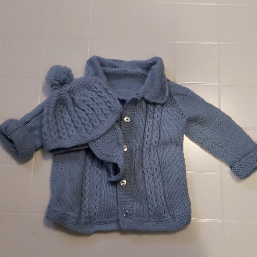 Handmade knitted infant sweater and hat